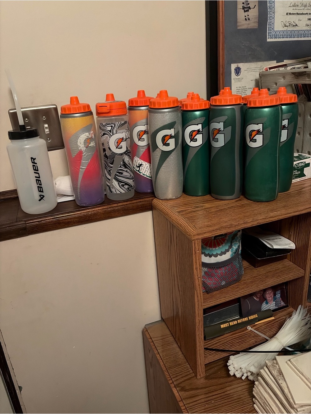 12 20 oz Gatorade water bottles and 1 Bauer Bottle